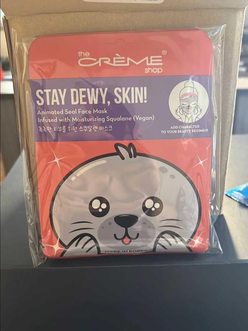 the CRÈME shop Stay Dewy, Skin! Animated Seal Face Mask - Pink & Purple Pack 3